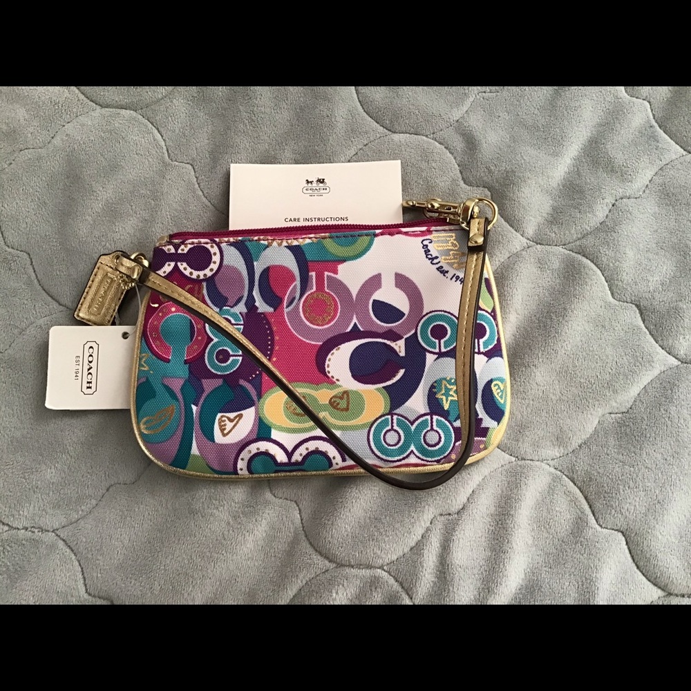 Coach multi-colored wristlet with tags